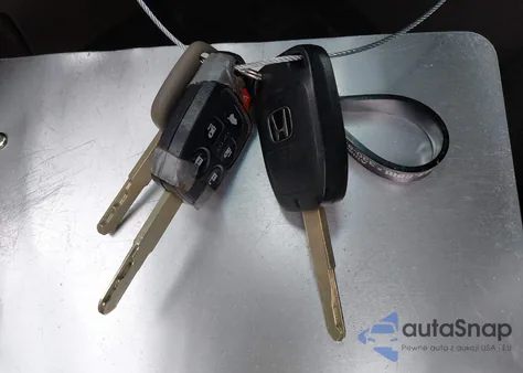 2012 Honda Odyssey Ex-L z USA, uszkodzony, nr VIN 5FNRL5H69CB146844